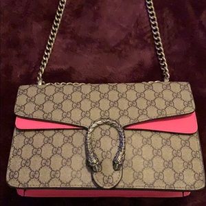 Brown and Pink double G chain strap purse.